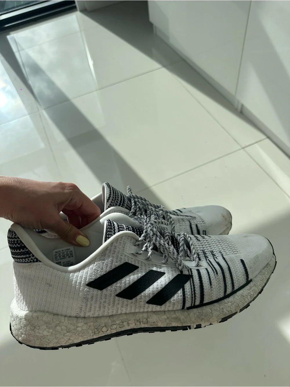 adidas White and Black Running Shoe with Boost Midsole